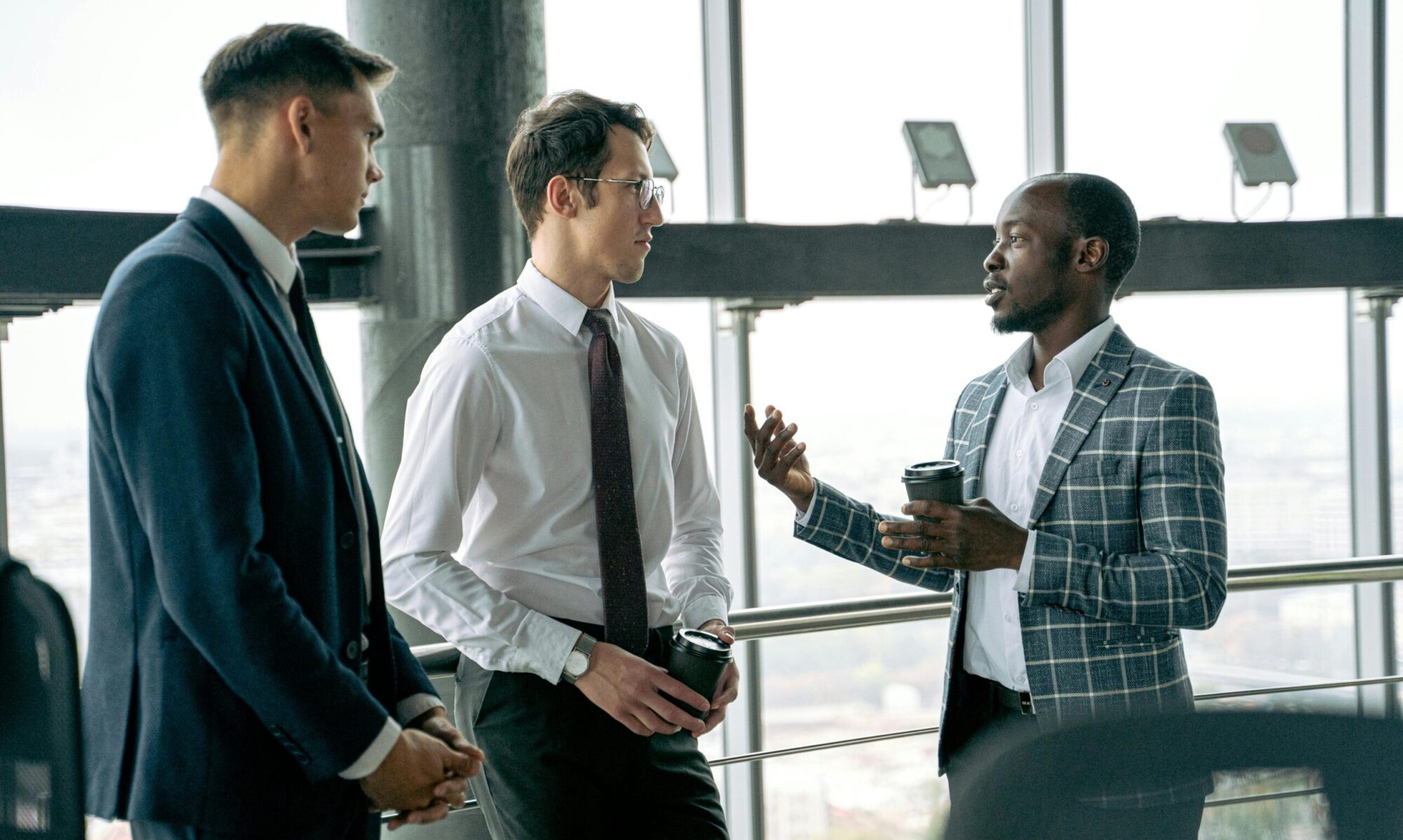 Photo by Antoni Shkraba: https://www.pexels.com/photo/three-men-talking-together-5584004/