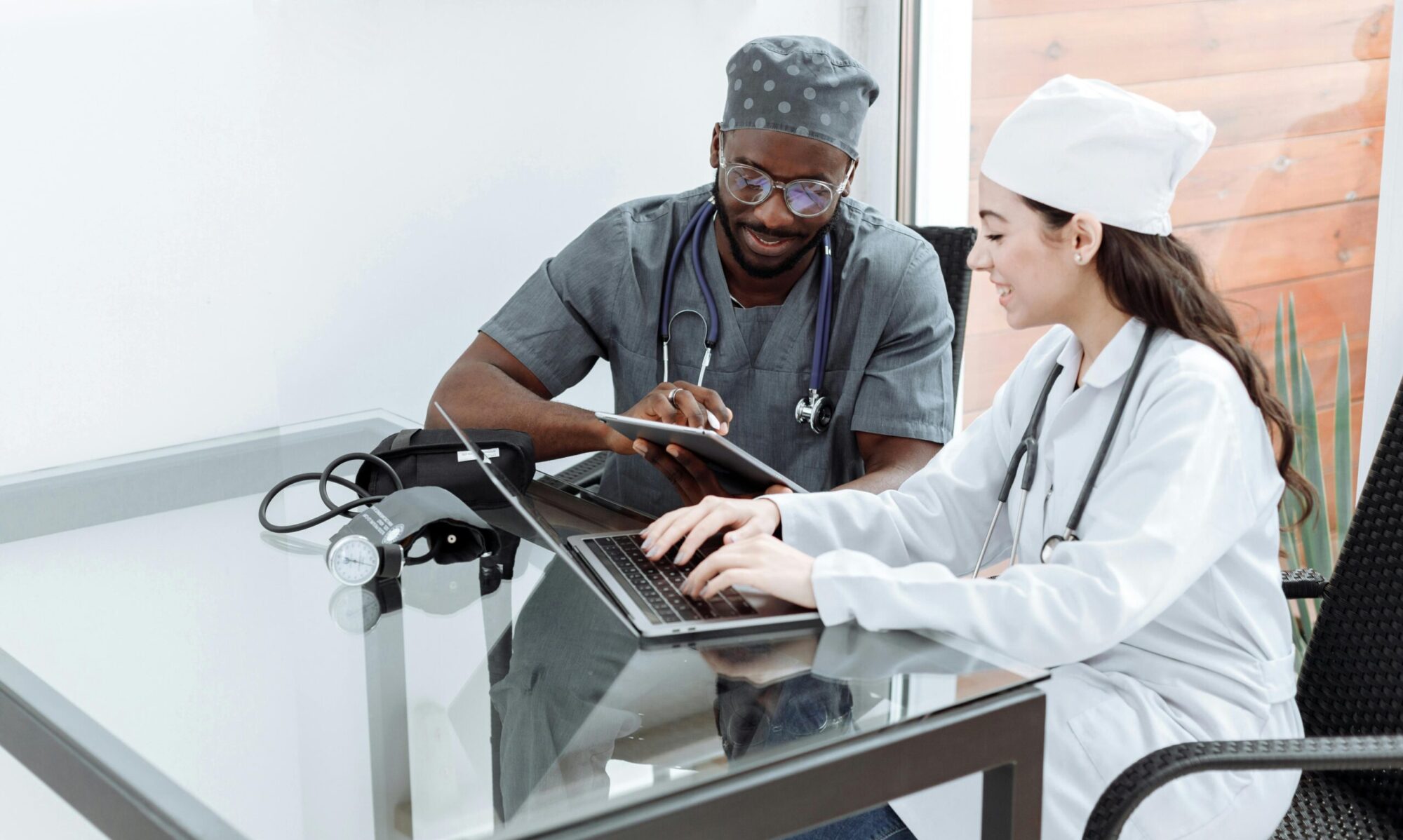 Photo by Thirdman: https://www.pexels.com/photo/healthcare-professionals-working-on-their-gadgets-while-sitting-next-to-each-other-5327654/